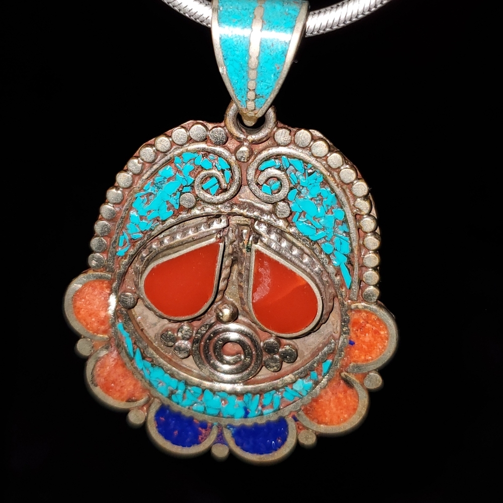 Tibetan Silver Pendant on a Snake Chain